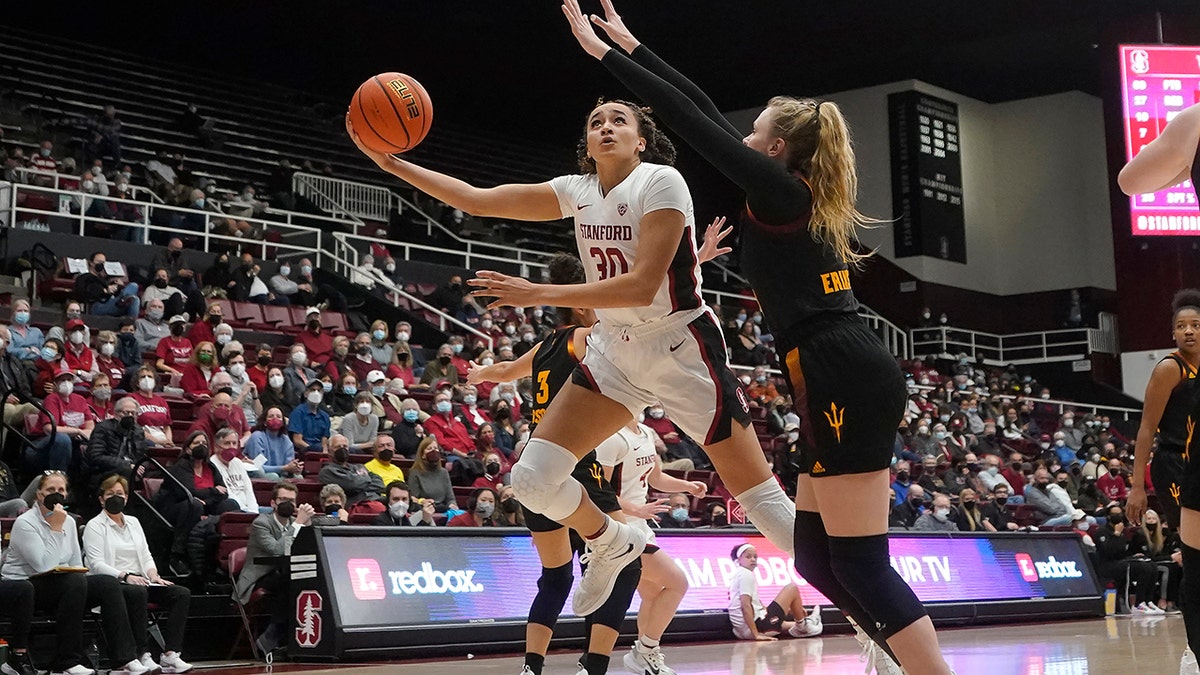 Stanford guard Haley Jones (30) shoots against Arizona State guard Sydney Erikstrup during the second half of an NCAA college basketball game in Stanford, Calif., Friday, Jan. 28, 2022.