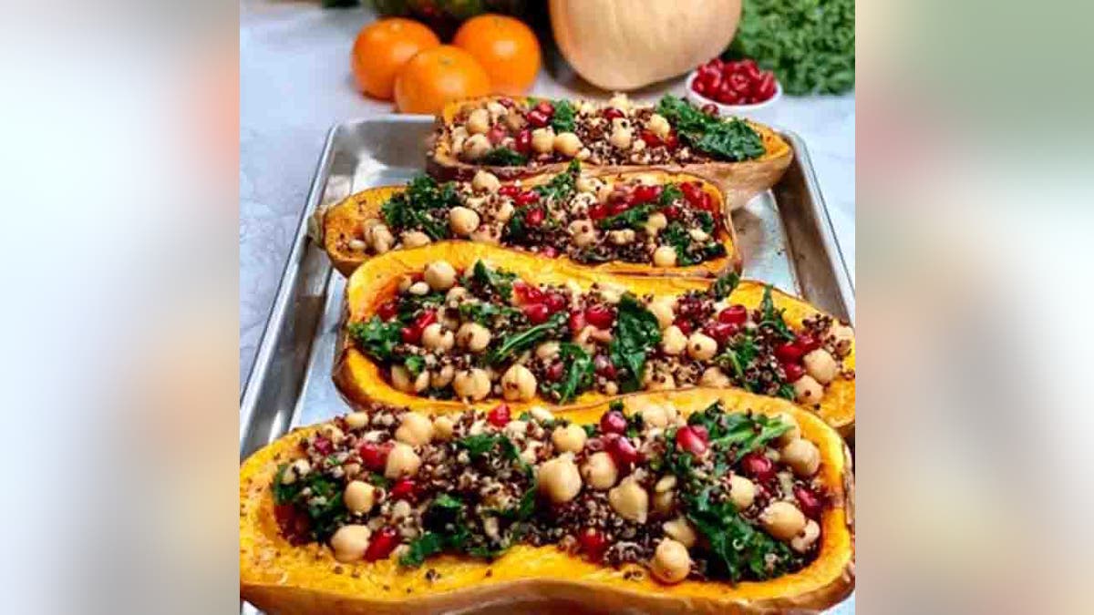 Hearty Stuffed Butternut Squash with Quinoa and Toasted Pine Nuts by Serena Poon of SerenaLoves.com 