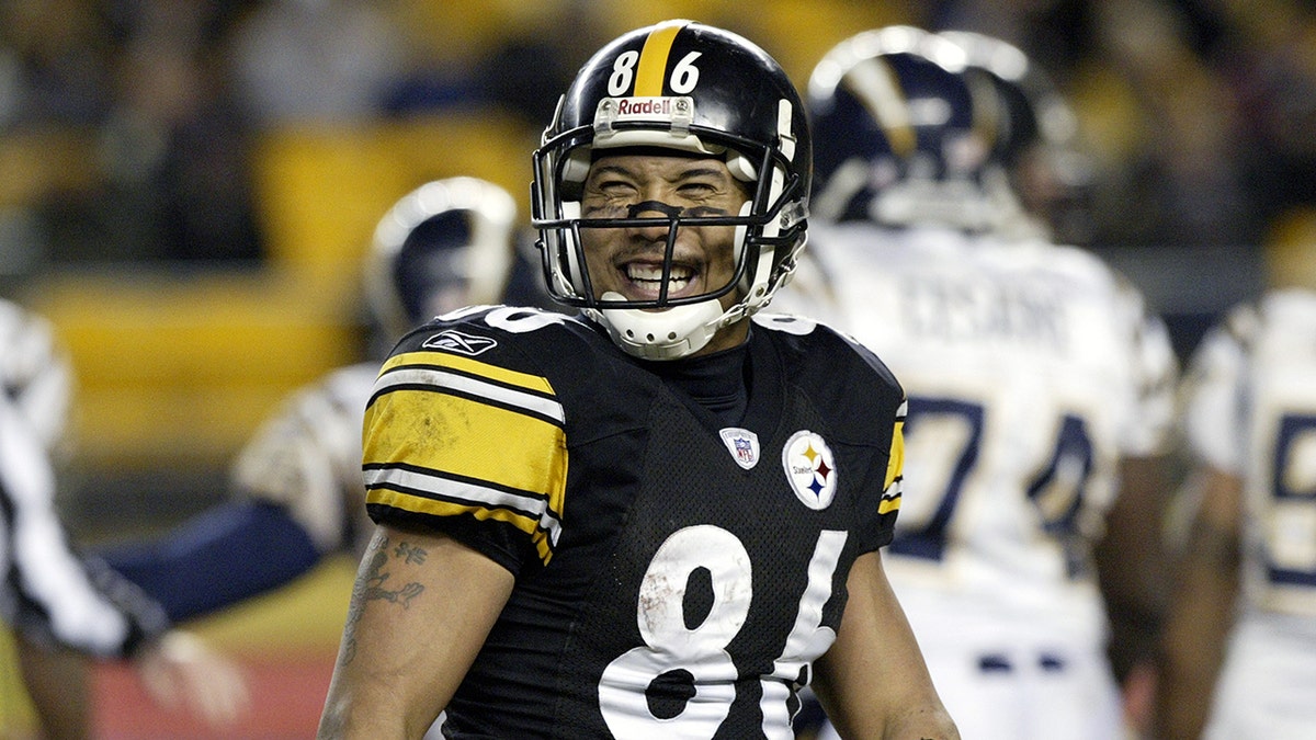 Wide receiver Hines Ward #86 of the Pittsburgh Steelers smiles as he looks on from the field during a game against the San Diego Chargers at Heinz Field on December 21, 2003 in Pittsburgh, Pennsylvania.