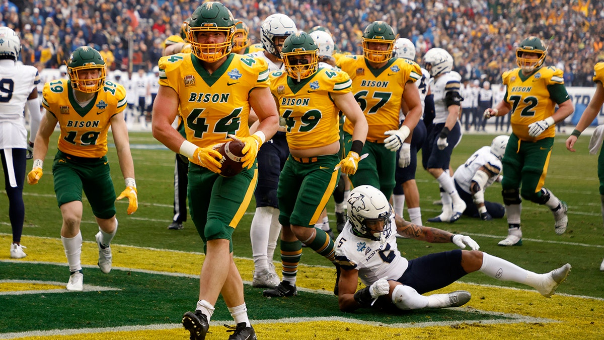North Dakota State fullback Hunter Luepke (44) celebrates his touchdown against Montana State during the first half of the FCS Championship NCAA college football game in Frisco, Texas, Saturday, Jan. 8, 2022.
