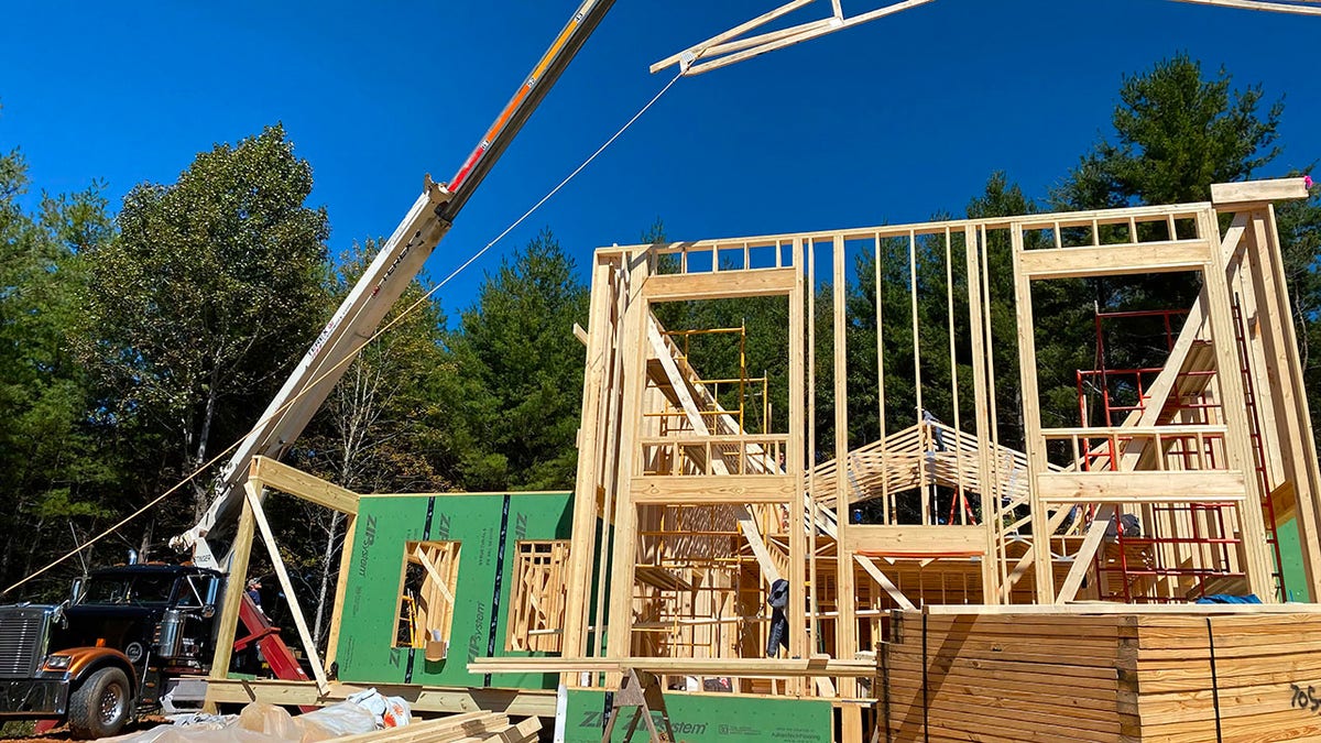 Crews build the first professional foster home in North Buncombe County. 