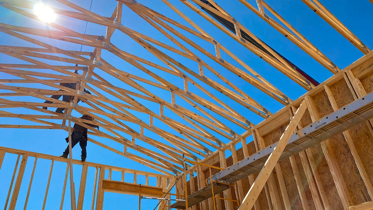 Crews build the first professional foster home in North Buncombe County. 