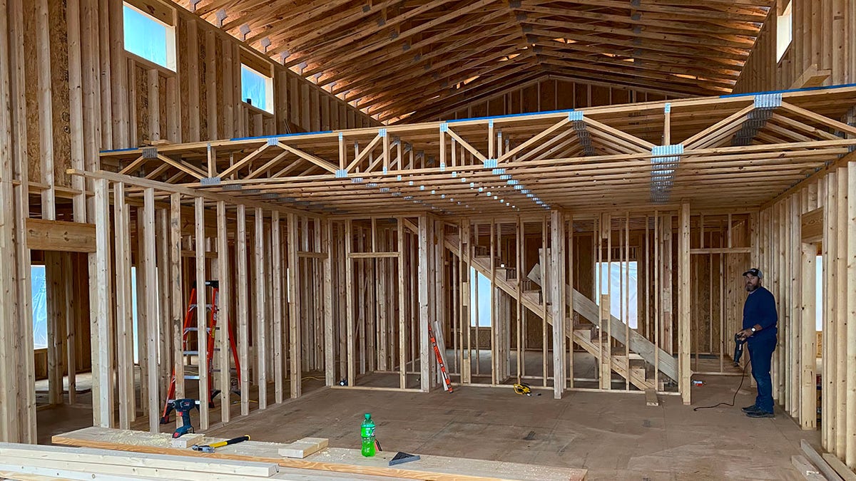 Crews build the first professional foster home in North Buncombe County. 