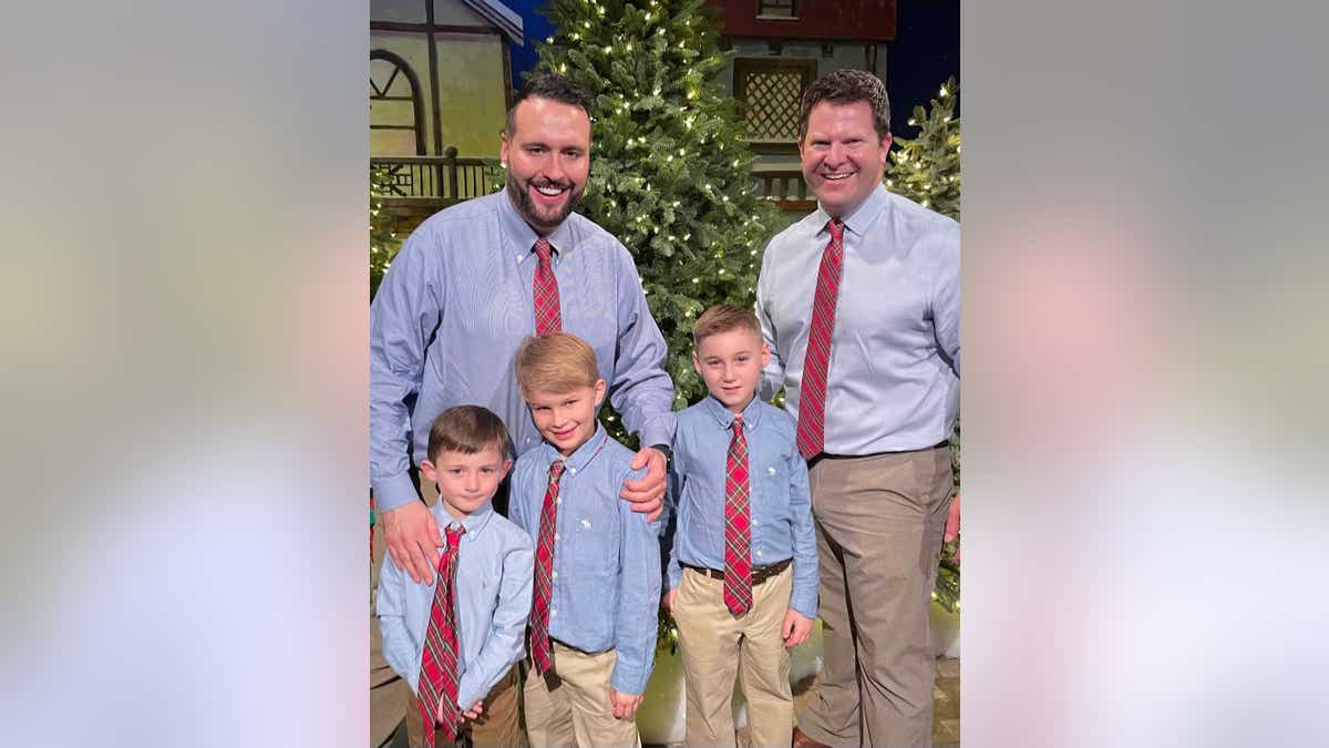 The Millers and their three adopted sons, including Jamison