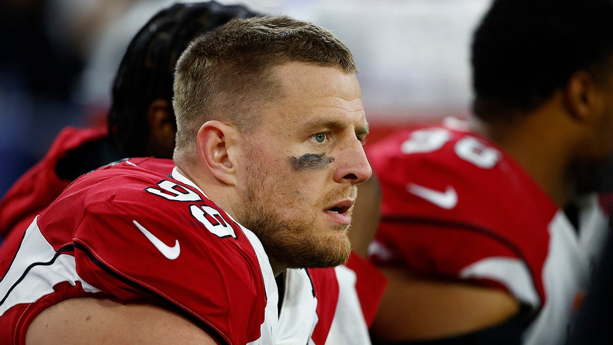 J.J. Watt of the Arizona Cardinals looks on from the sidelines against the Los Angeles Rams during the third quarter in the NFC Wild Card Playoff game at SoFi Stadium on Jan. 17, 2022, in Inglewood, California.