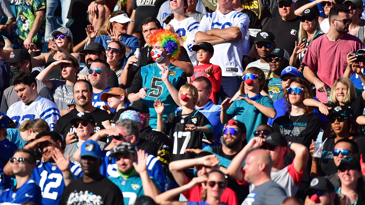 Fans dressed up as clowns during the fourth quarter in the game between the Jacksonville Jaguars and the Indianapolis Colts at TIAA Bank Field on January 09, 2022 in Jacksonville, Florida.