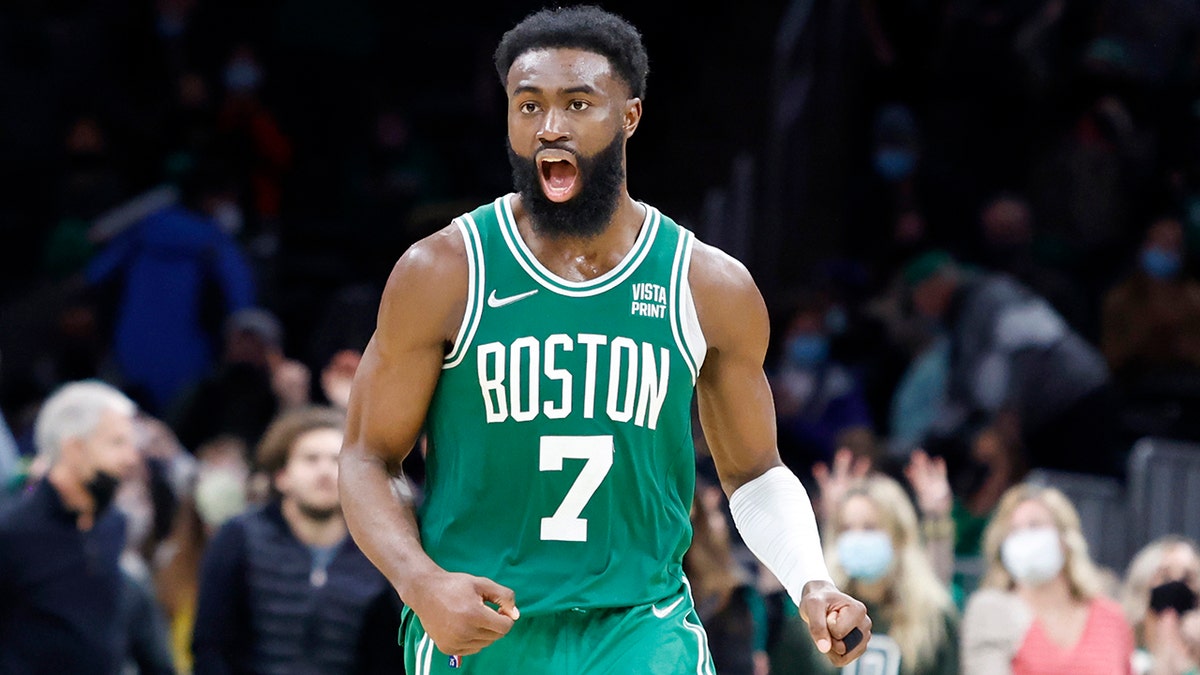 Boston Celtics guard Jaylen Brown (7) reacts during overtime of an NBA basketball game against the Orlando Magic, Sunday, Jan. 2, 2022, in Boston. 