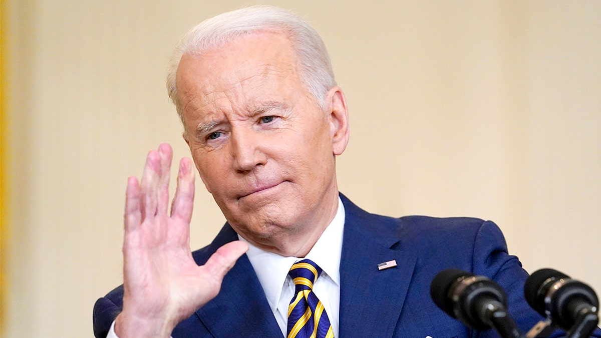 President Joe Biden gestures as he speaks during a news conference in the East Room of the White House in Washington, Wednesday, Jan. 19, 2022.