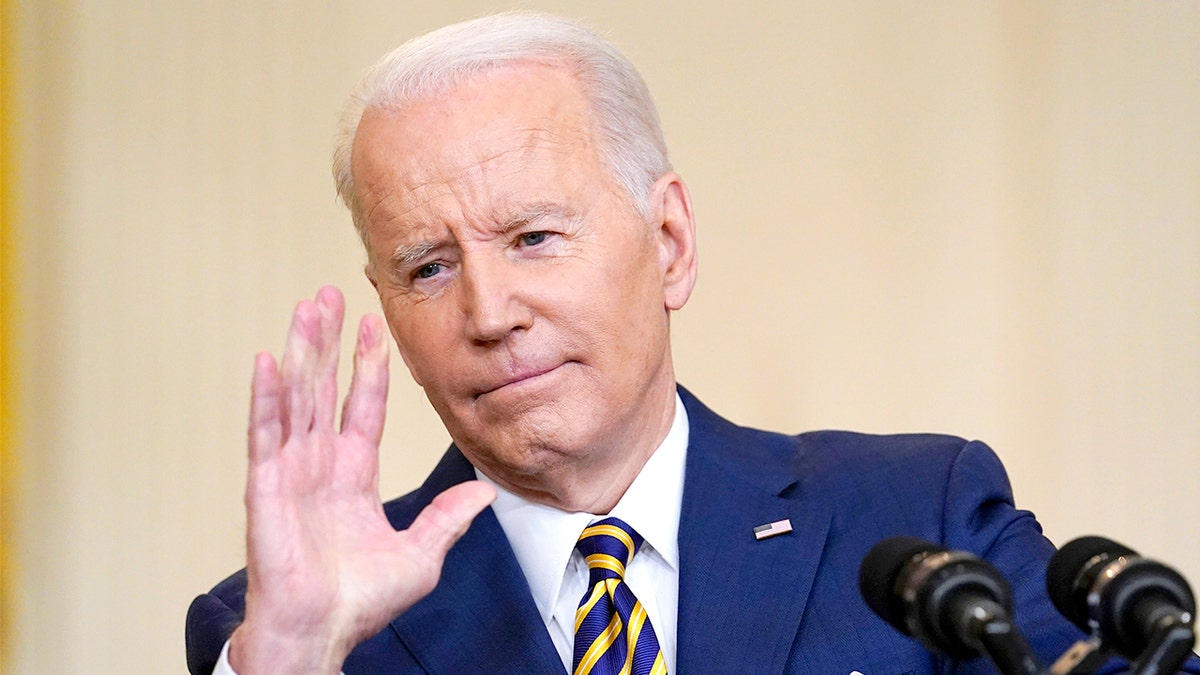 President Joe Biden gestures as he speaks during a news conference in the East Room of the White House in Washington, Wednesday, Jan. 19, 2022. 