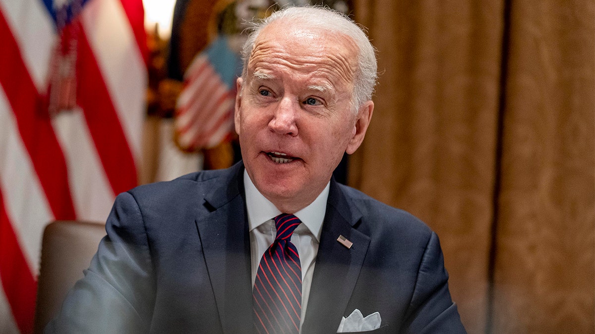President Biden meets with members of the Infrastructure Implementation Task Force to discuss the Bipartisan Infrastructure Law, in the Cabinet Room at the White House in Washington, Thursday, Jan. 20, 2022.