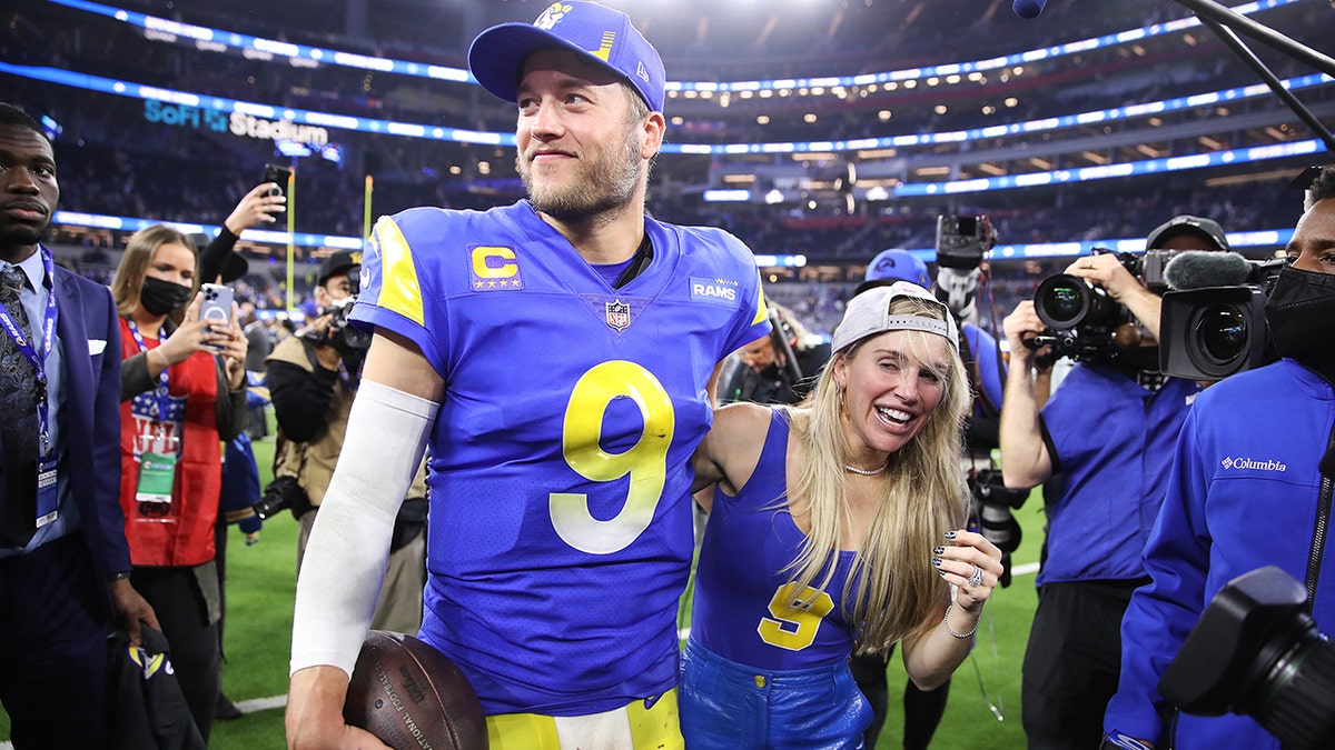 Matthew Stafford #9 of the Los Angeles Rams and wife Kelly Stafford