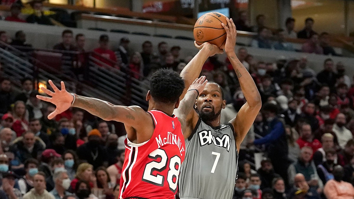Kevin Durant shoots during a game