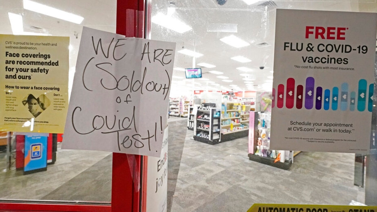 A sign was posted at the front of this CVS pharmacy at the Capitol in Jackson, Miss., Monday, Jan. 3, 2022. It was widely reported that the at-home COVID-19 tests were in very short supply throughout the state. (AP Photo/Rogelio V. Solis) 