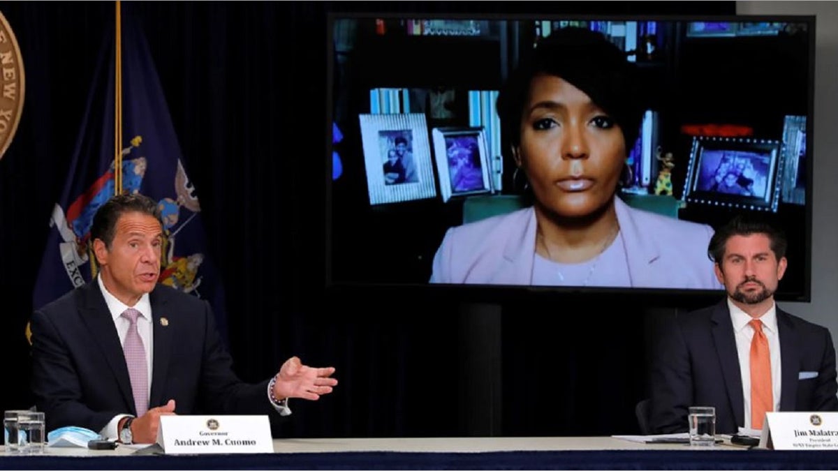 Then-New York Gov. Andrew Cuomo speaks as he is joined via video conference by Atlanta Mayor Keisha Lance Bottoms, during the Governor's daily briefing following the outbreak of the coronavirus disease (COVID-19) in Manhattan in New York City on July 13, 2020. At right is Jim Malatras, president of SUNY Empire State College. Malatras officially resigned on Jan. 14. REUTERS/Mike Segar (REUTERS/Mike Segar)