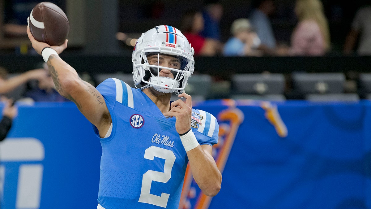 Mississippi quarterback Matt Corral warms up for the team' Sugar Bowl NCAA college football game against Baylor in New Orleans, Saturday, Jan. 1, 2022.