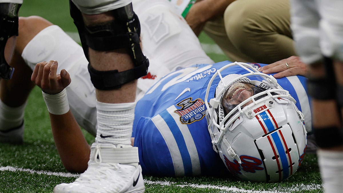 Matt Corral #2 of the Mississippi Rebels reacts after being injured against the Baylor Bears during the first quarter in the Allstate Sugar Bowl at Caesars Superdome on January 01, 2022 in New Orleans, Louisiana.