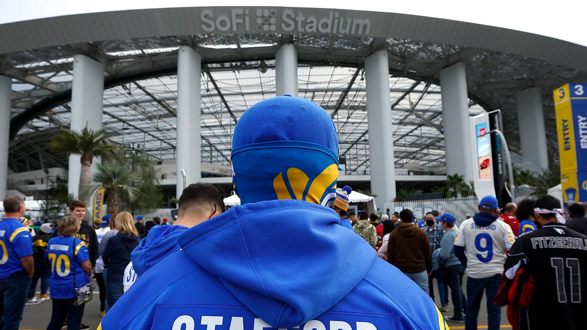 Los Angeles Rams fans get ready for the game between the Los Angeles Rams and the Arizona Cardinals in the NFC Wild Card Playoff game at SoFi Stadium on January 17, 2022 in Inglewood, California.