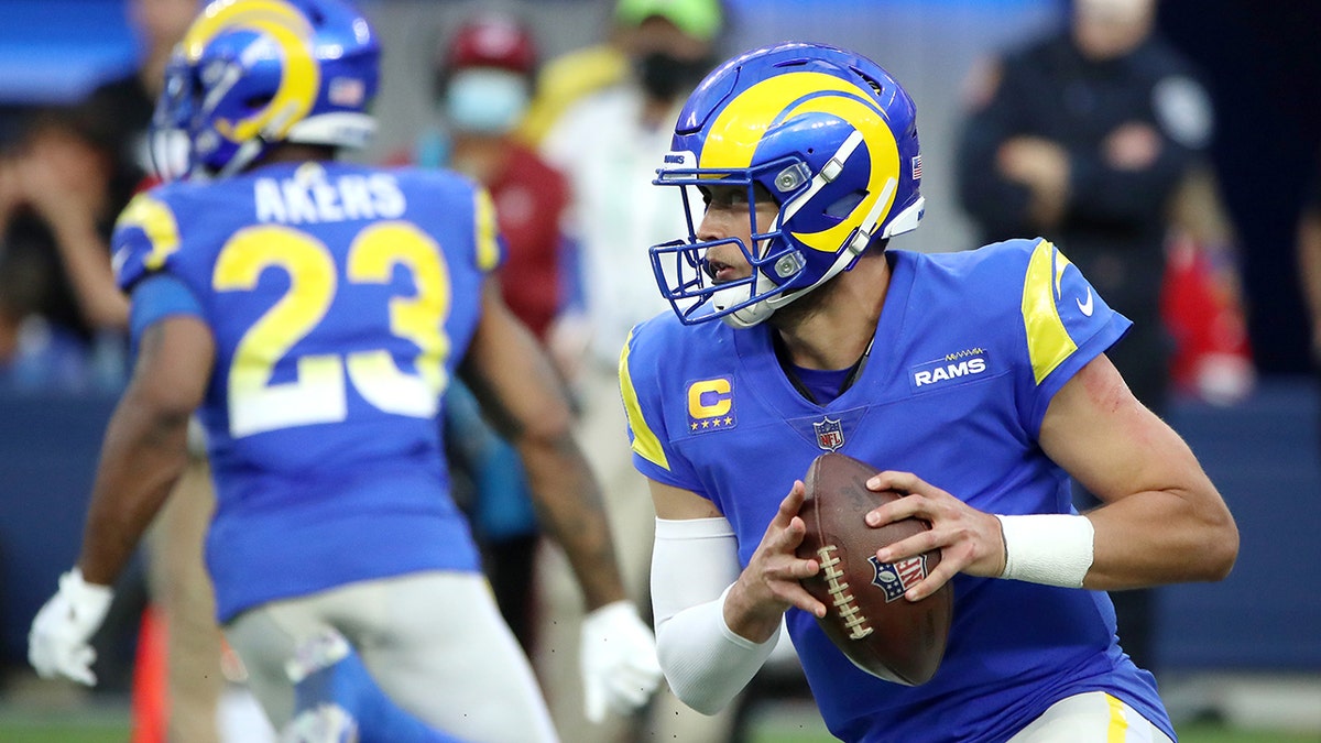 Matthew Stafford looks to pass during a game