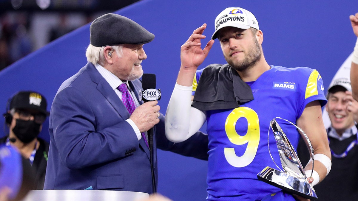 Los Angeles Rams quarterback Matthew Stafford (9) talks with Terry Bradshaw after defeating the San Francisco 49ers in the NFC Championships at SoFi Stadium on Sunday, Jan. 30, 2022, in Los Angeles, California.