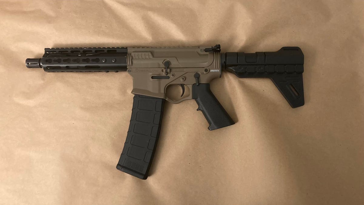 Police said they recovered a "loaded AR-15" under McNeil's mattress after the shooting.