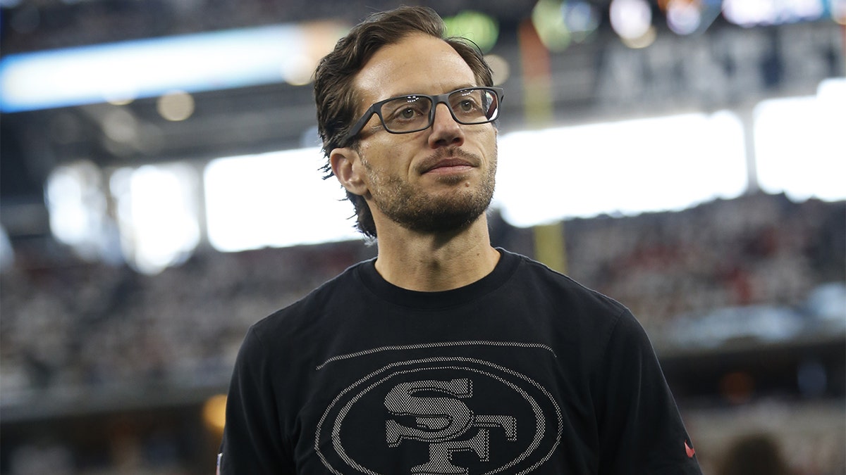 ARLINGTON, TX - JANUARY 16: Offensive Coordinator Mike McDaniel of the San Francisco 49ers on the field before the NFC Wild Card Playoff game against the Dallas Cowboys at AT&T Stadium on January 16, 2022 in Arlington, Texas. (Photo by Michael Zagaris/San Francisco 49ers/Getty Images)
