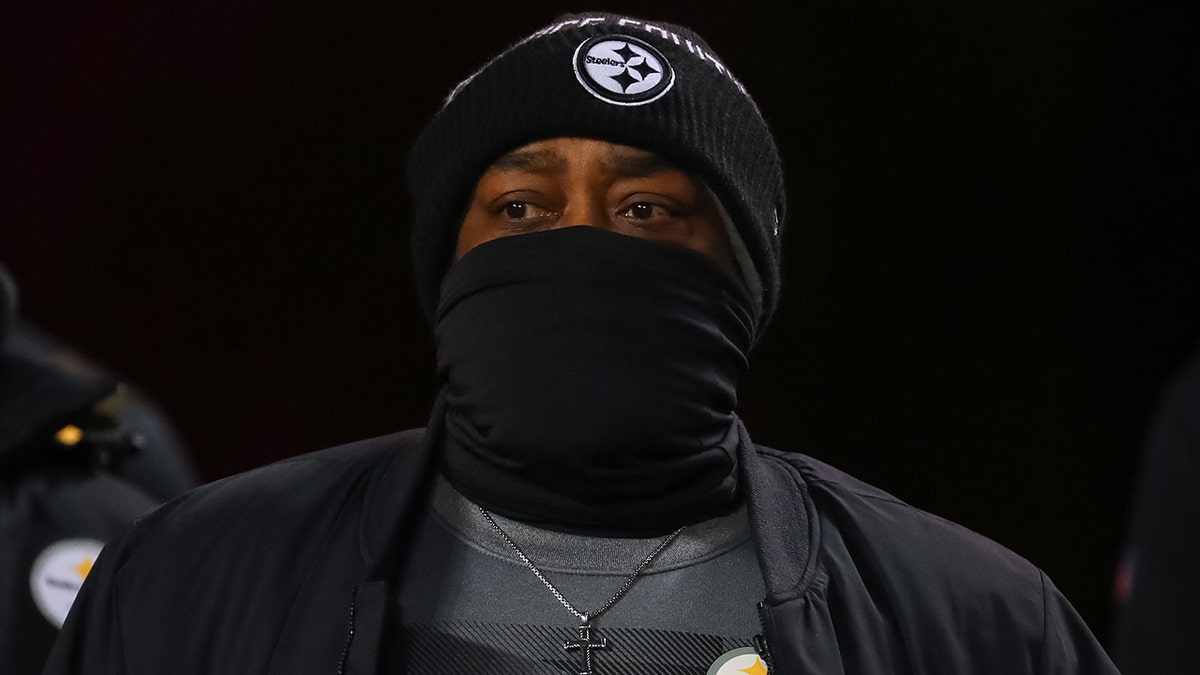 Head Coach Mike Tomlin of the Pittsburgh Steelers enters the field before the game against the Kansas City Chiefs in the NFC Wild Card Playoff game at Arrowhead Stadium on January 16, 2022 in Kansas City, Missouri.