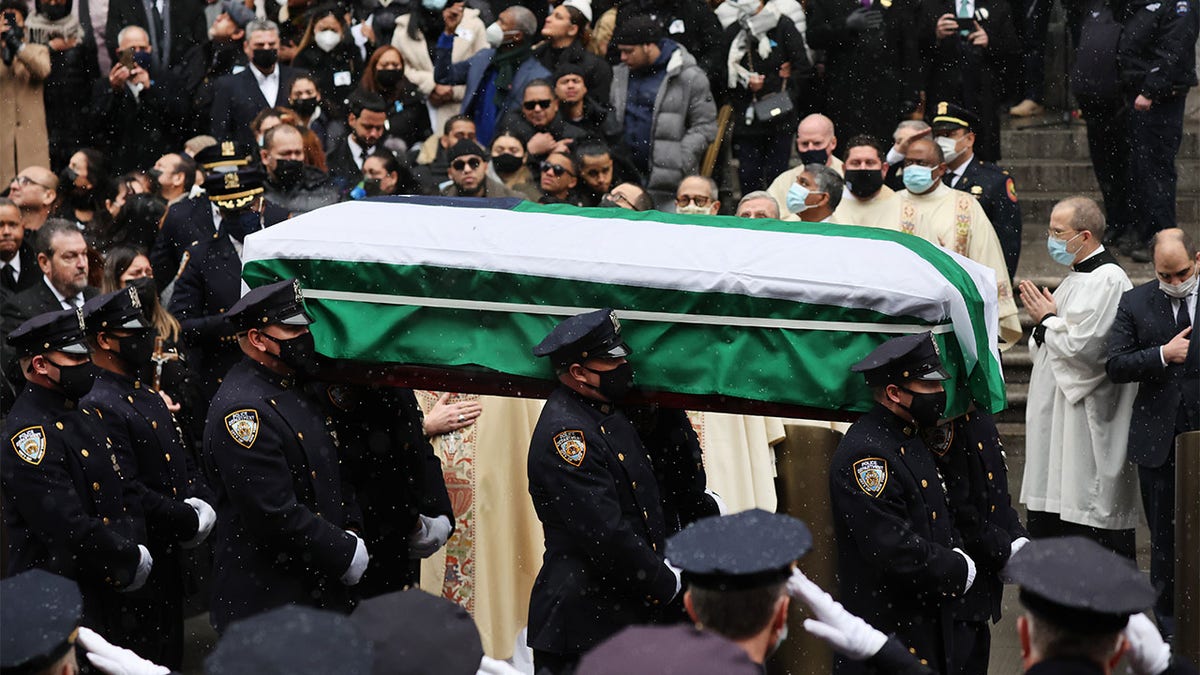 NEW YORK, NEW YORK - JANUARY 28: The casket of fallen NYPD Officer Jason Rivera is brought out of St. Patrick's Cathedral during his funeral on January 28, 2022 in New York City.  (Photo by Spencer Platt/Getty Images)