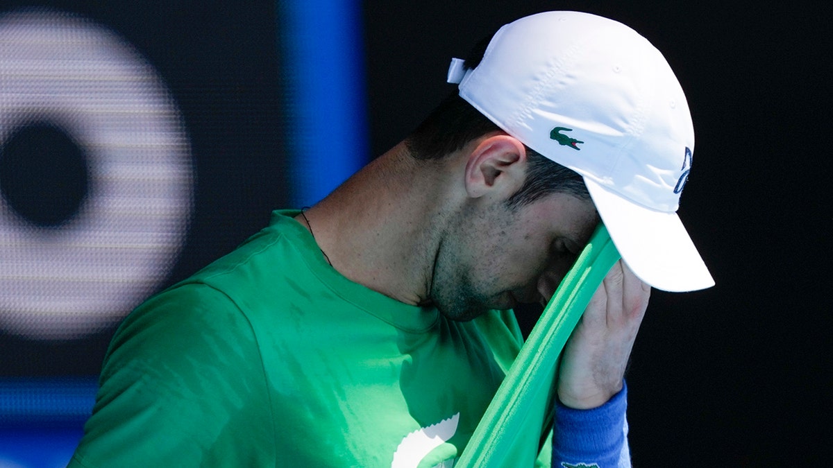 FILE - Defending men's champion Serbia's Novak Djokovic practices on Margaret Court Arena ahead of the Australian Open tennis championship in Melbourne, Australia, on Jan. 13, 2022. Tennis star Djokovic faces deportation again after the Australian government revoked his visa for a second time. Immigration