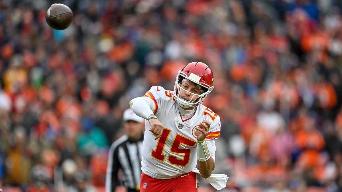 Patrick Mahomes of the Kansas City Chiefs passes against the Denver Broncos at Empower Field at Mile High on Jan. 8, 2022, in Denver, Colorado.
