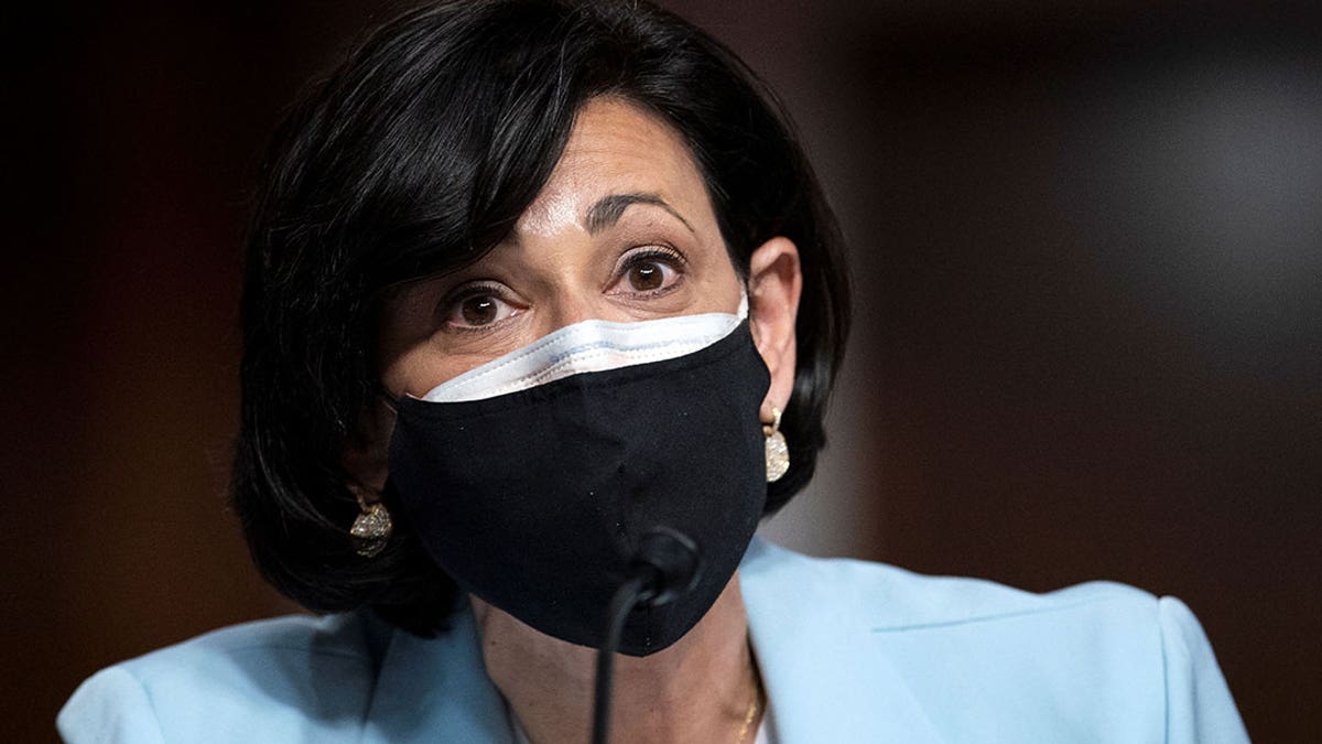 CDC Director Rochelle Walensky wears a mask