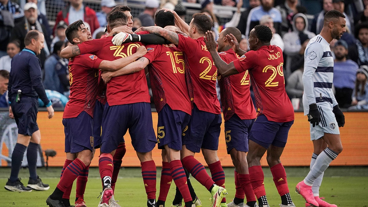 Real Salt Lake players celebrate after a win over Sporting Kansas City in the conference semifinals of the 2021 MLS playoffs at Children's Mercy Park in November 2021.