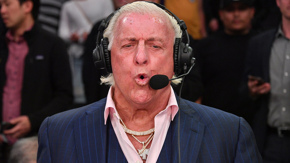 Ric Flair joins a telecast during a basketball game between the Los Angeles Lakers and the New Orleans Pelicans at Staples Center on February 25, 2020 in Los Angeles, California.