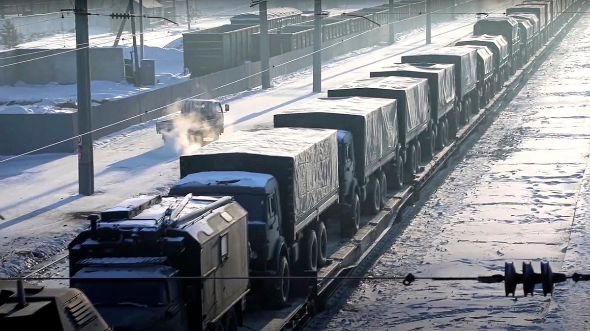 Russian military vehicles on a railway platform on their way to attend joint military drills in Belarus, in Russia, on Monday.
