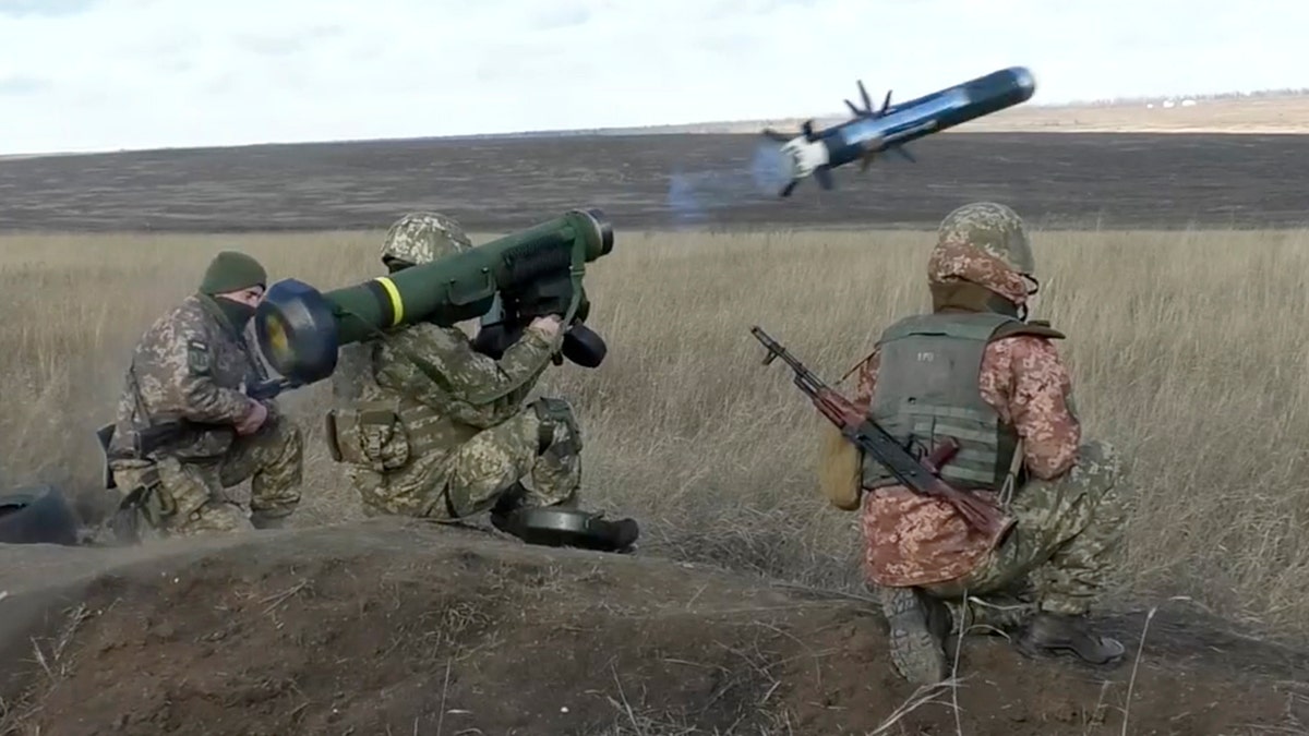 Ukrainian soldiers use a launcher with U.S. Javelin missiles during military exercises in Donetsk region, Ukraine, Wednesday, Jan. 12, 2022. 