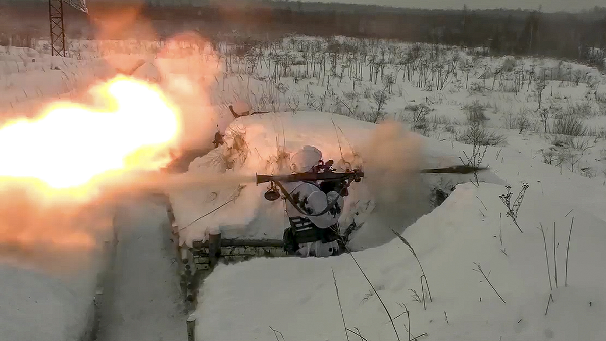 In this photo taken from video provided by the Russian Defense Ministry Press Service on Tuesday, a Russian paratrooper attends a military exercise at the Pesochnoe training ground in the Yaroslavl region.