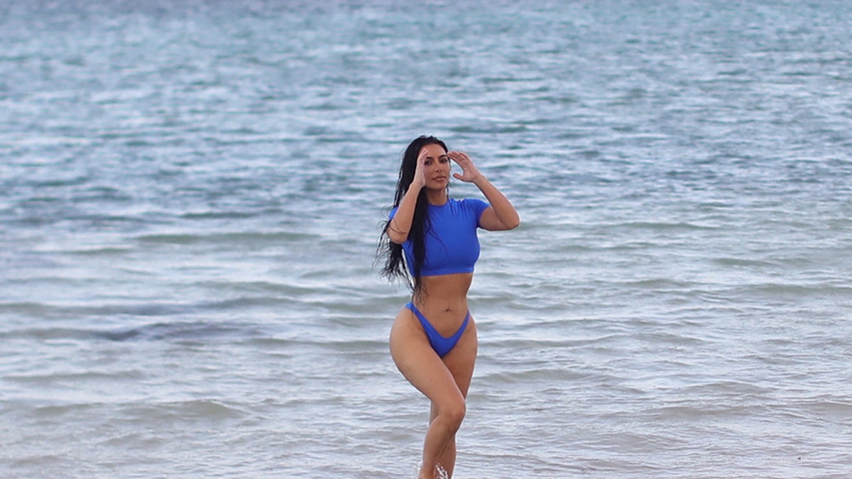 WornOnTV: Kim's blue swim shorts on The Kardashians, Kim Kardashian