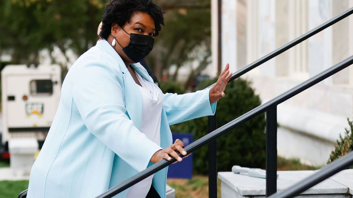 Stacey Abrams, former Georgia gubernatorial candidate, leaves after meeting President Biden and Vice-President Kamala Harris during a stop at Emory University in Atlanta, Georgia, March 19, 2021.