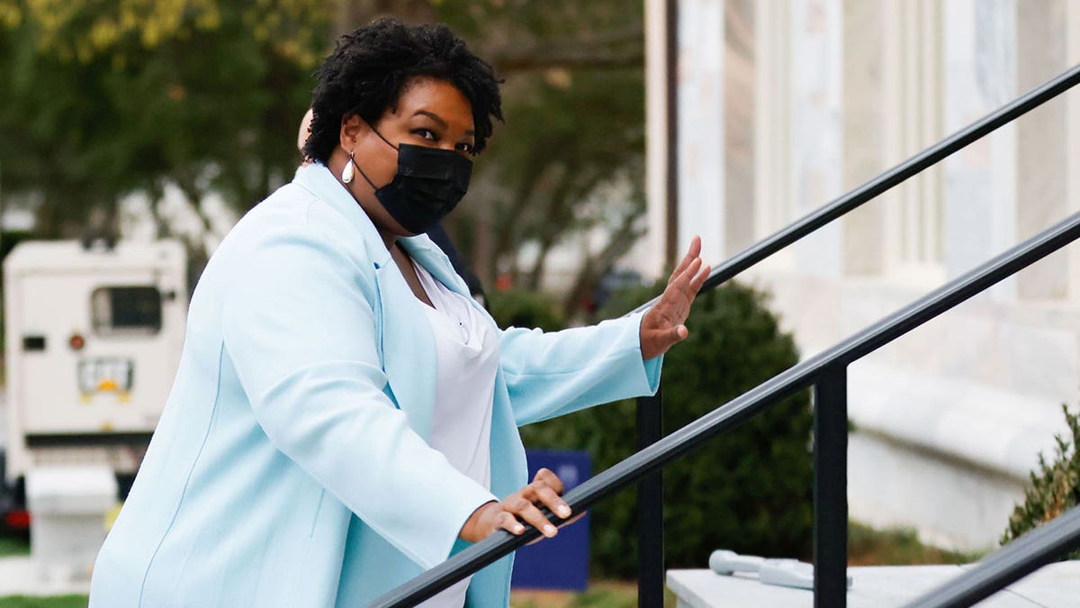 Stacey Abrams, former Georgia gubernatorial candidate, leaves after meeting President Biden and Vice-President Kamala Harris during a stop at Emory University in Atlanta, Georgia, March 19, 2021.