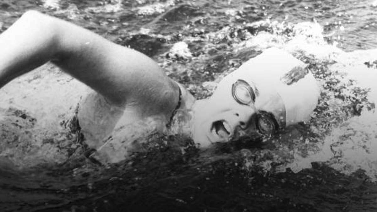 Sandra competing in a marathon swim across Lake Saint Jean in Canada in 1974.