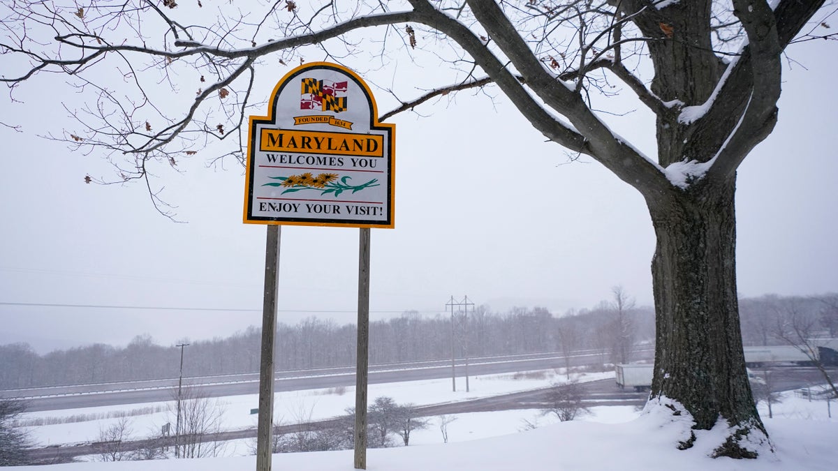 Snow covers the Youghiogheny Overlook Welcome Center in Friendsville, Md. (AP Photo/Julio Cortez)