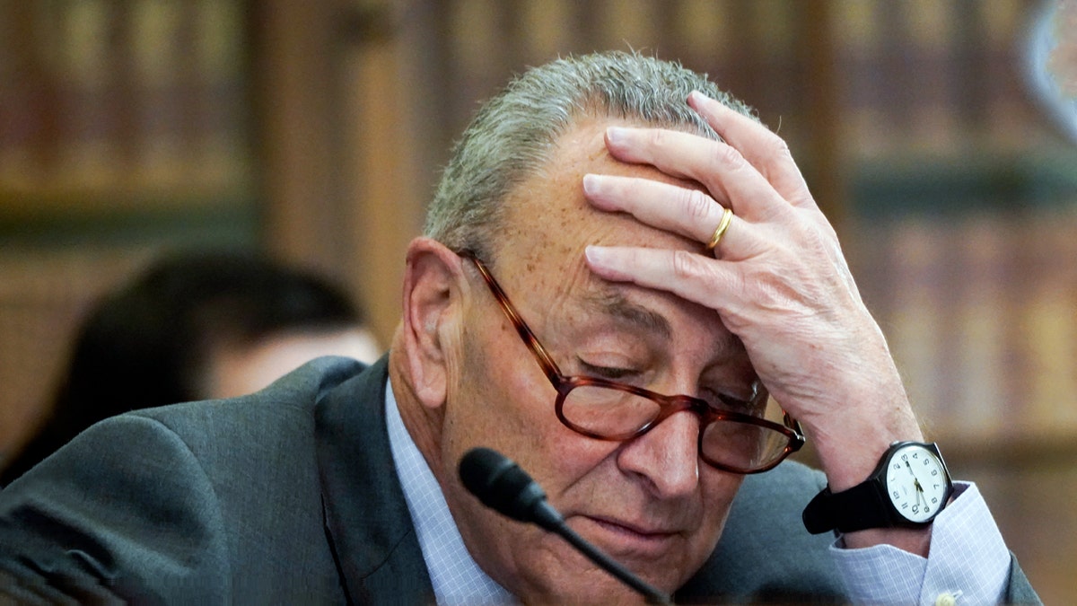 Senate Majority Leader Chuck Schumer of New York is seated before a Senate Rules and Administration Committee oversight hearing on the Jan. 6, 2021, attack on the Capitol on Wednesday, Jan. 5, 2022, in Washington. 