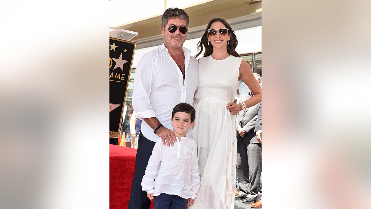 Simon Cowell, Lauren Silverman and their son Eric in 2018.