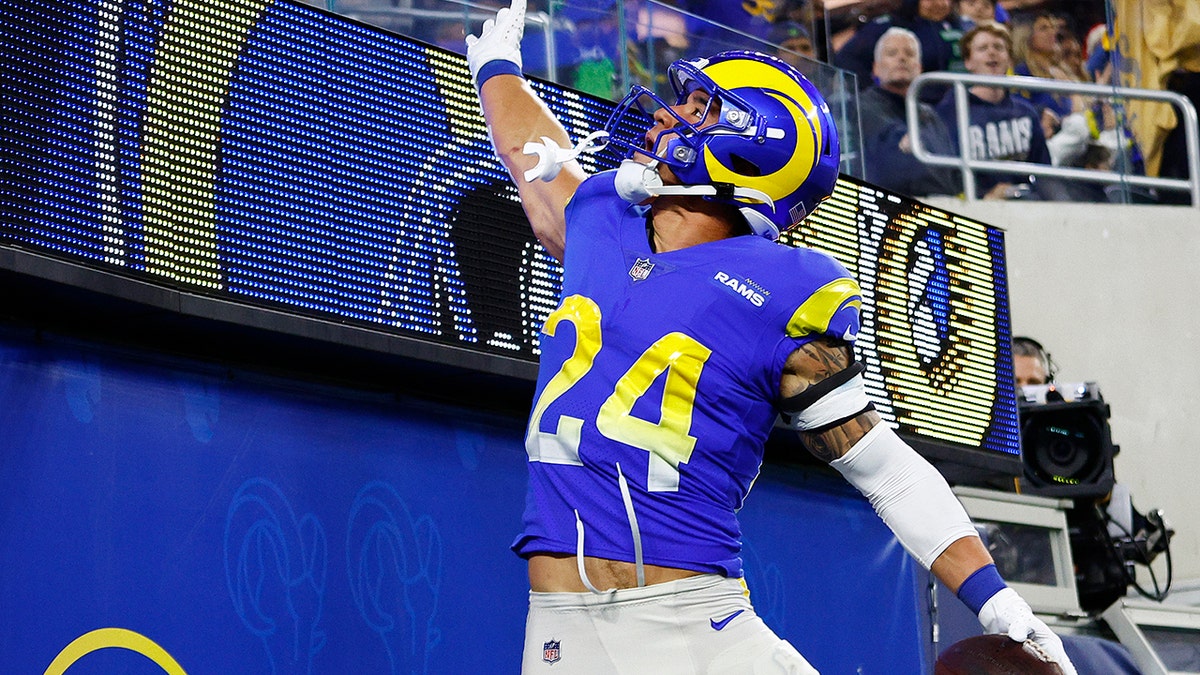 Taylor Rapp of the Los Angeles Rams celebrates after an interception against the Seattle Seahawks at SoFi Stadium on Dec. 21, 2021, in Inglewood, California.