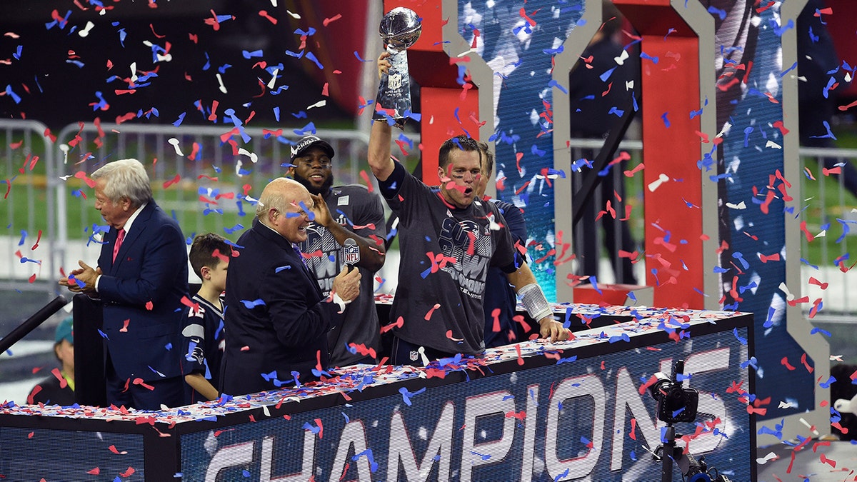 Tom Brady of the New England Patriots raises the Vince Lombardi trophy after the Patriots defeated the Atlanta Falcons 34-28 in overtime of Super Bowl 51 at NRG Stadium Feb. 5, 2017 in Houston.