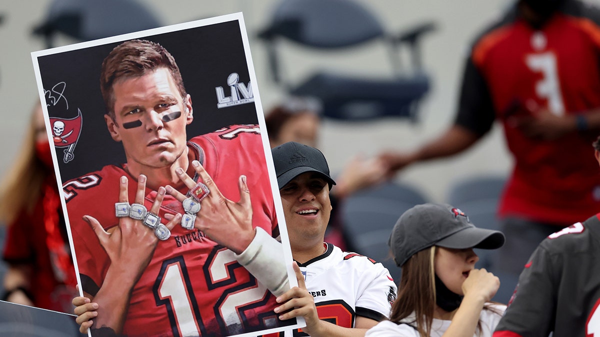 Tom Brady fans during warmup before the Tampa Bay Buccaneers' game against the Los Angeles Rams at SoFi Stadium on Sept. 26, 2021, in Inglewood, California.