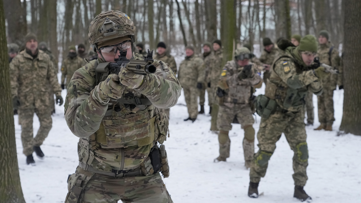 Members of Ukraine's Territorial Defense Forces, volunteer military units of the Armed Forces, train in a city park in Kyiv, Ukraine, on Saturday.