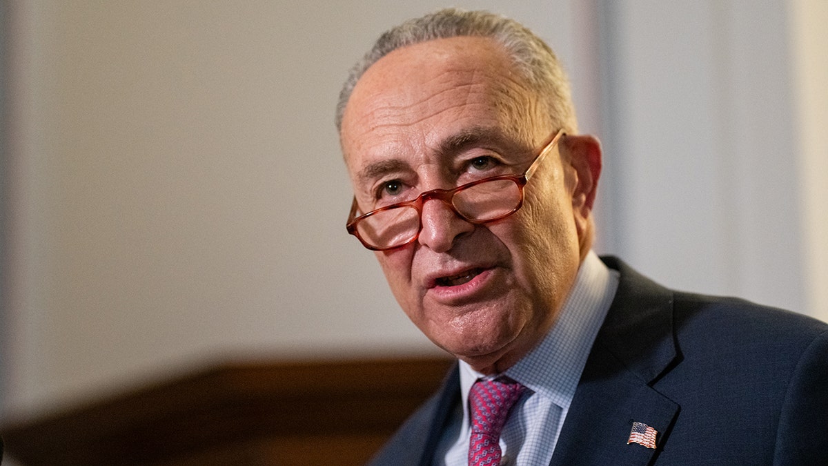 Senate Majority Leader Chuck Schumer, a Democrat from New York, speaks to members of the media at the Russell Senate Office Building in Washington, on Thursday, Jan. 13, 2022. 