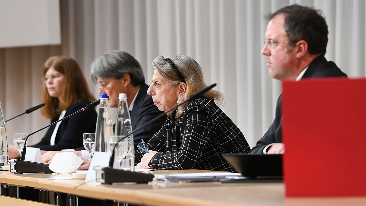 Barbara Leyendecker, Ulrich Wastl, Marion Westpfahl and Martin Pusch, from left, from the Munich law firm Westpfahl Spilker Wastl at the presentation of the expert report on cases of sexual abuse in the Catholic Archdiocese of Munich and Freising in Munich, Germany, Thursday, Jan. 20, 2022.