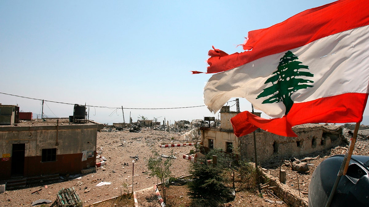 A Lebanese flag flies over Khiam prison, on Aug. 16, 2006, in the southern town of Khiam, Lebanon. 
