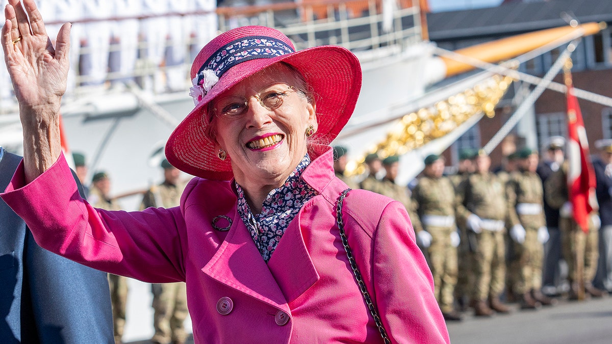 Denmark's Queen Margrethe waves on arrival during the summer voyage to Esbjerg, Denmark, Aug. 31, 2021.